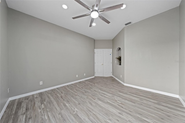 spare room featuring ceiling fan and light wood-type flooring