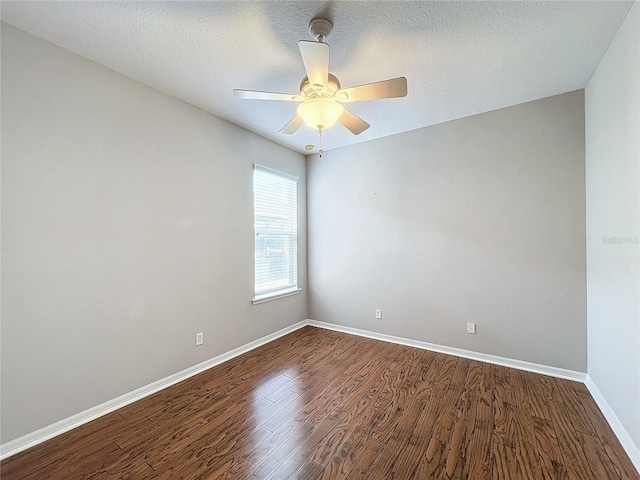 spare room featuring wood-type flooring, a textured ceiling, and ceiling fan