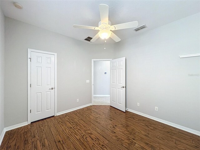 unfurnished bedroom with hardwood / wood-style flooring and ceiling fan