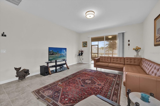 living room with tile patterned floors