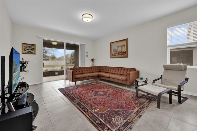 living room with light tile patterned flooring