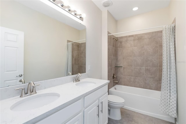 bathroom with tile patterned flooring, a sink, toilet, and shower / bathtub combination with curtain