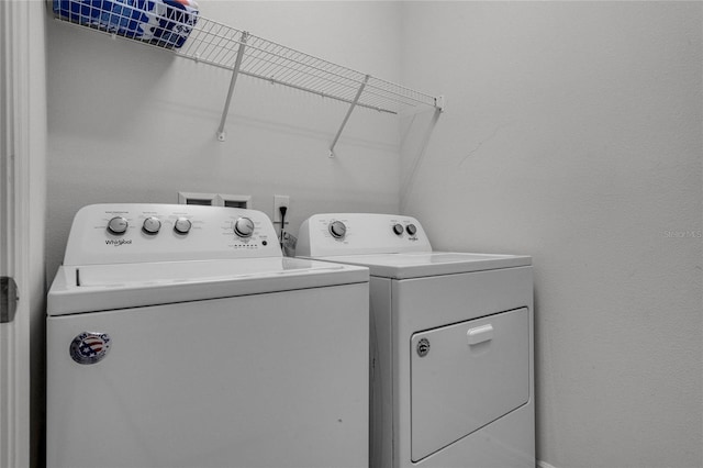 washroom featuring separate washer and dryer