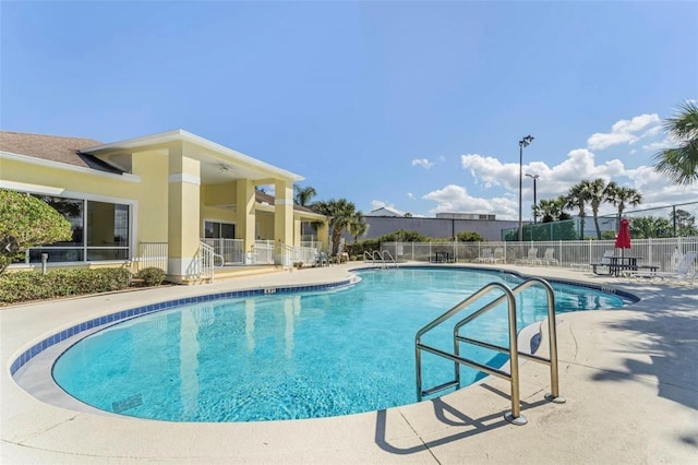 view of swimming pool featuring a patio