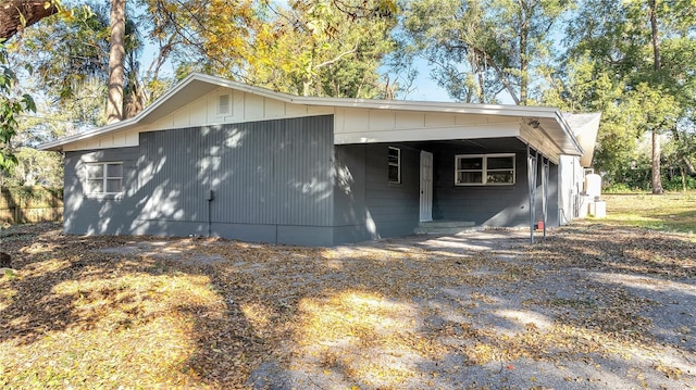 exterior space with a carport