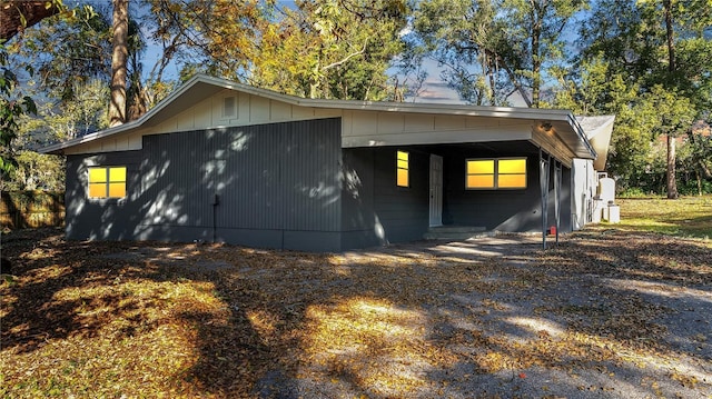 exterior space with a carport