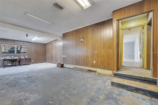 basement with wooden walls