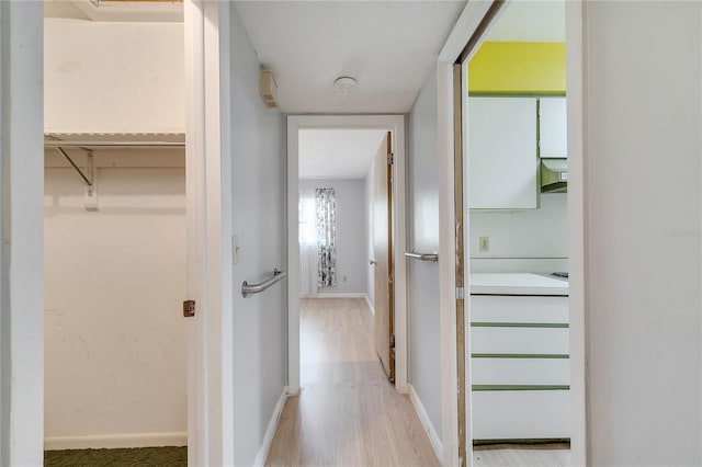 hallway featuring light wood-type flooring