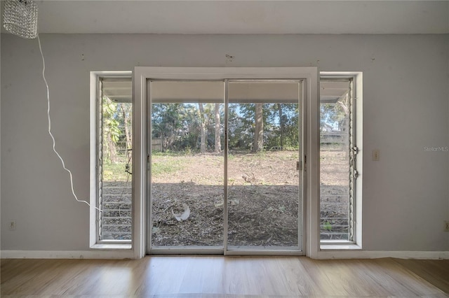 entryway with light hardwood / wood-style floors