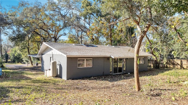 view of home's exterior featuring a yard