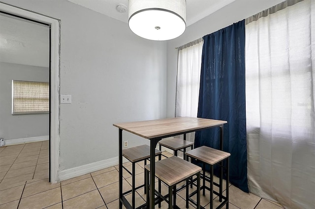 view of tiled dining space