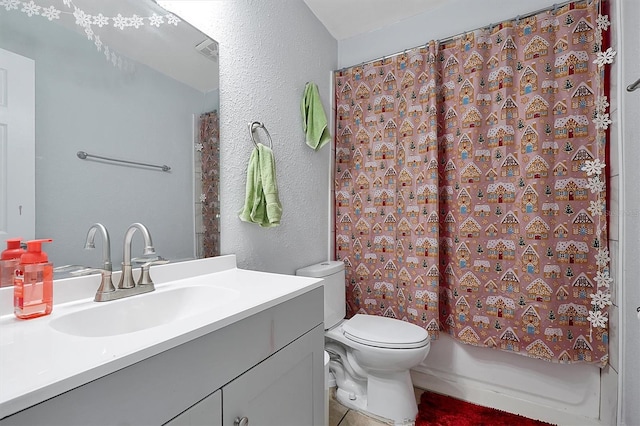 full bathroom with vanity, shower / bath combination with curtain, and toilet