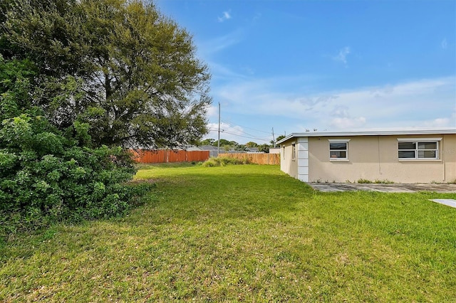 view of yard with fence