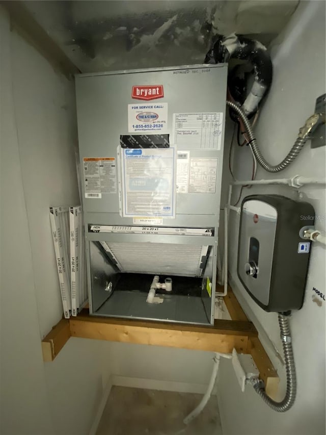 utility room with heating unit