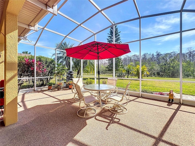 view of patio / terrace with glass enclosure