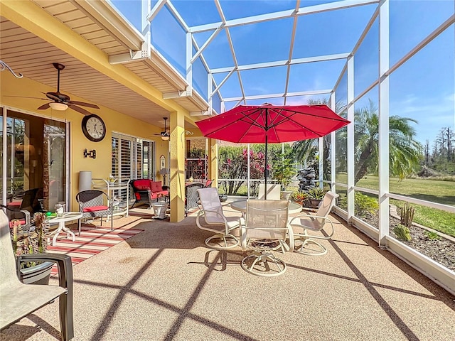 view of patio with a lanai and ceiling fan