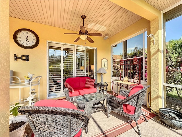 view of patio with ceiling fan and an outdoor hangout area