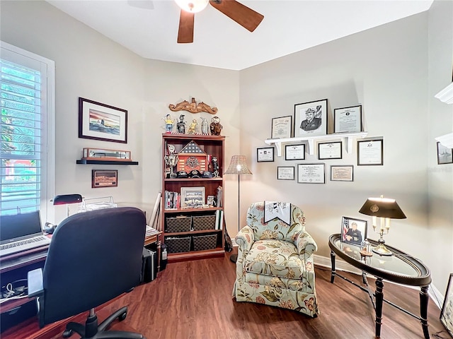 office with hardwood / wood-style flooring and ceiling fan