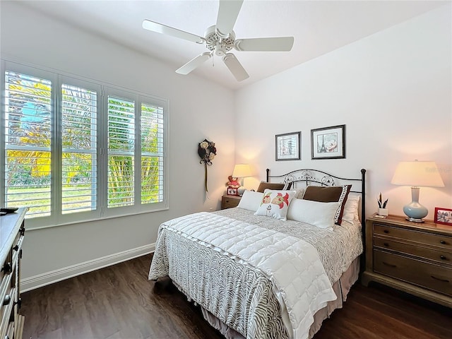 bedroom featuring dark hardwood / wood-style floors and ceiling fan