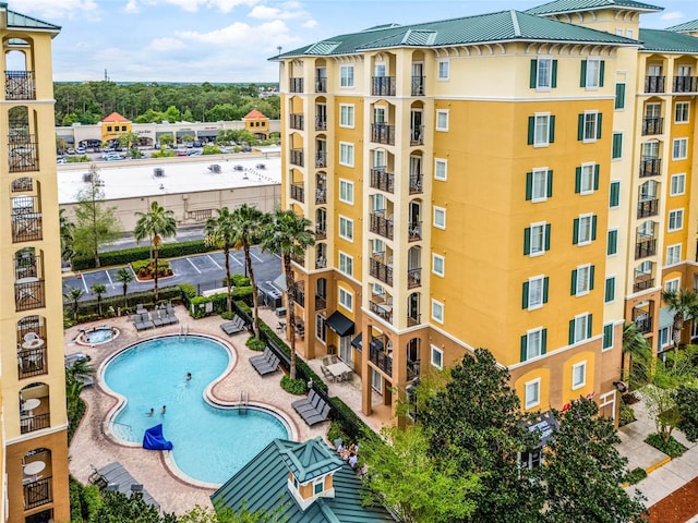 view of pool featuring a patio