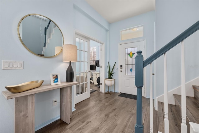 entrance foyer featuring wood-type flooring and french doors