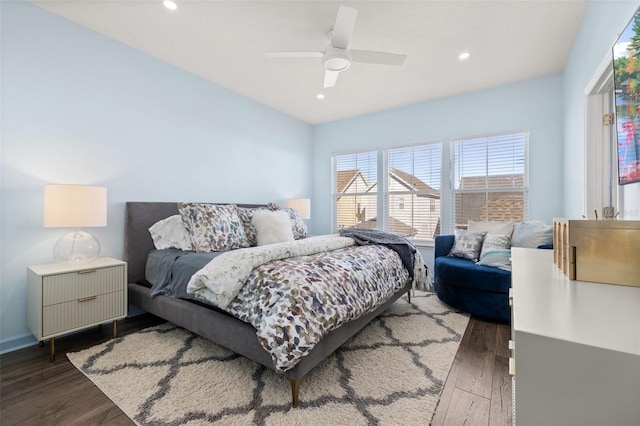 bedroom with dark wood-type flooring and ceiling fan