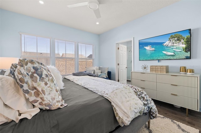 bedroom featuring dark wood-type flooring and ceiling fan