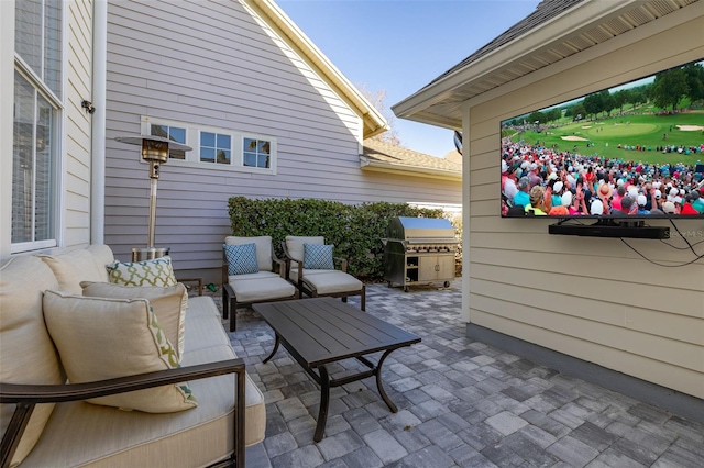 view of patio / terrace featuring grilling area and outdoor lounge area