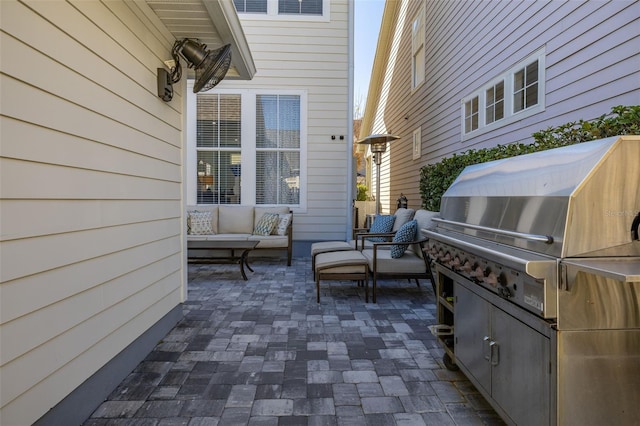 view of patio with exterior kitchen and outdoor lounge area