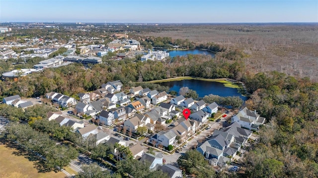 bird's eye view with a water view