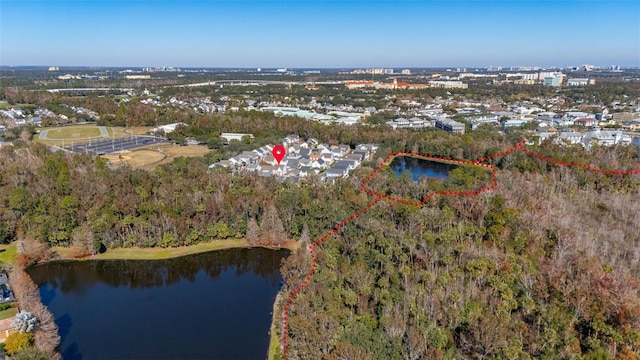 bird's eye view with a water view