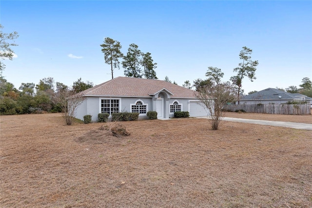 ranch-style house with a garage