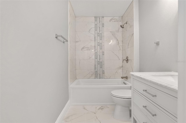 full bathroom with tiled shower / bath, vanity, and toilet