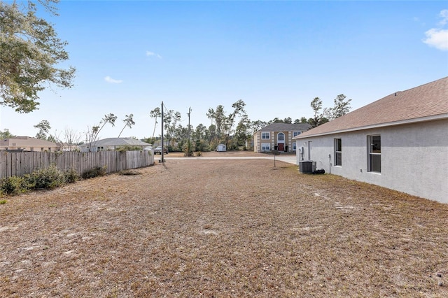 view of yard featuring central AC