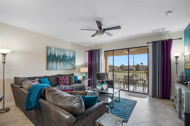 living room featuring ceiling fan and light tile patterned floors