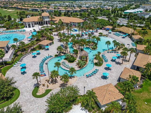 birds eye view of property with a residential view