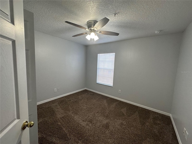 unfurnished room with a textured ceiling, carpet floors, and ceiling fan