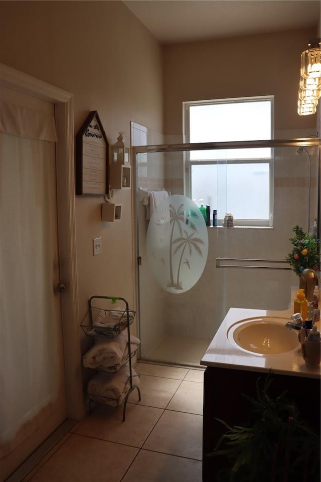 6002 Renaissance Ct, Saint Cloud, FL 34772 - full bath with an enclosed shower, vanity, and tile patterned flooring