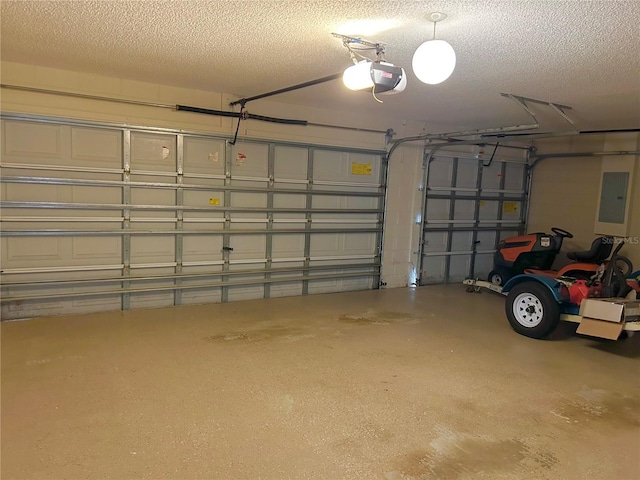 garage featuring a garage door opener and electric panel