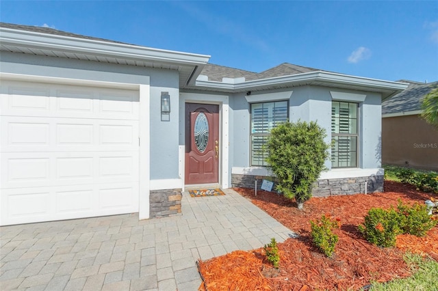 property entrance featuring a garage