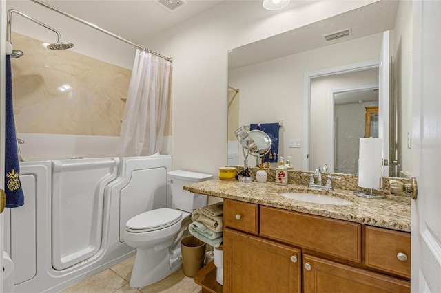 full bathroom with tile patterned flooring, vanity, shower / bath combo, and toilet