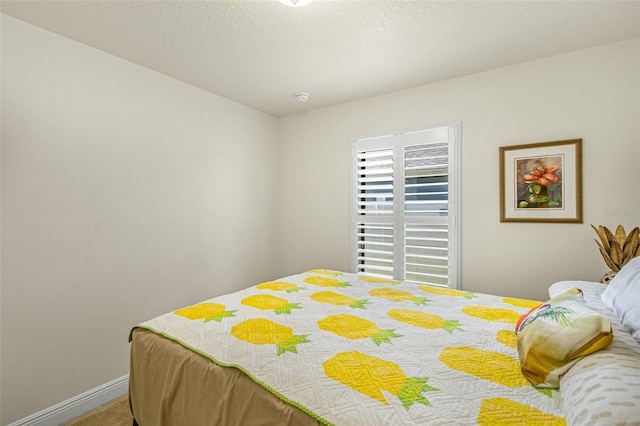 bedroom with a textured ceiling