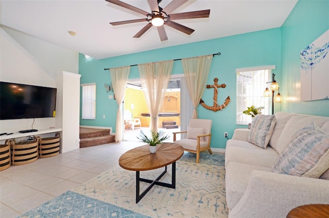 tiled living room featuring ceiling fan