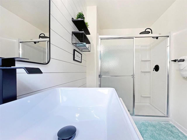 bathroom featuring walk in shower