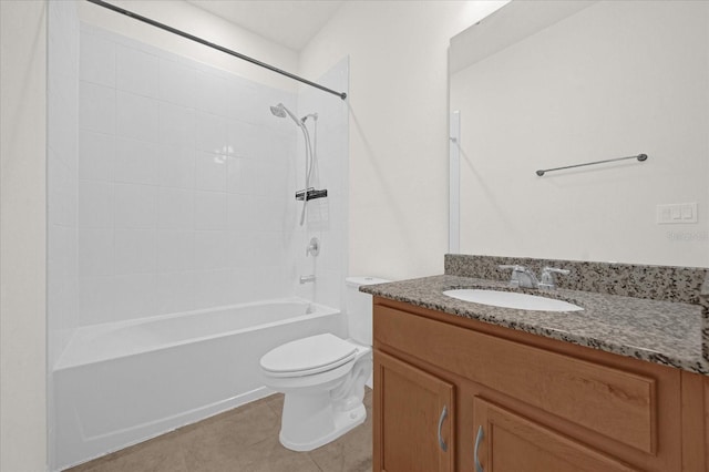 full bathroom featuring washtub / shower combination, vanity, toilet, and tile patterned flooring