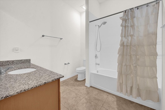 full bathroom featuring tile patterned flooring, vanity, shower / tub combo with curtain, and toilet