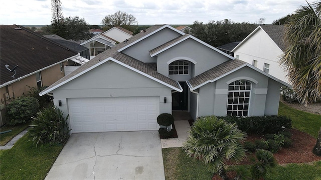 view of front of property with a garage