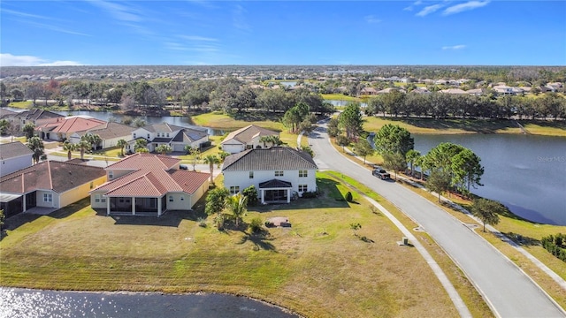 bird's eye view with a water view