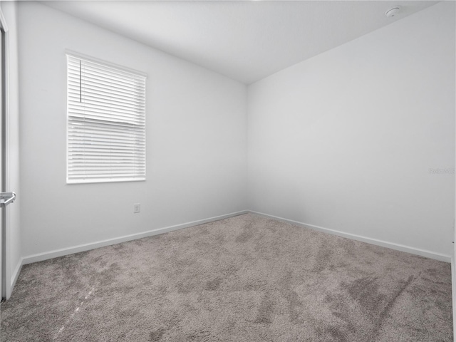 empty room featuring carpet flooring