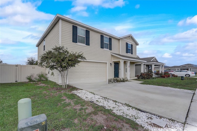 view of front property with a garage and a front lawn